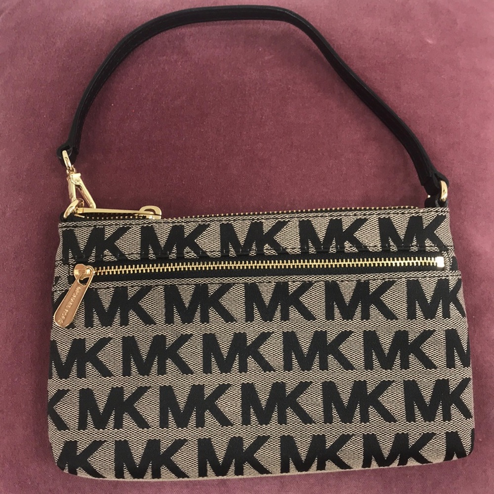 Michael Kors nude and black wristlet